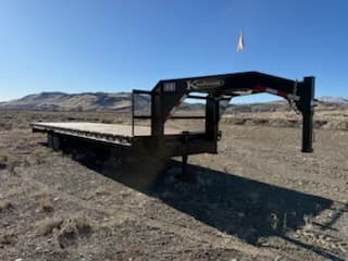 KAUFFMAN FLAT DECK TRAILER PRICE REDUCED