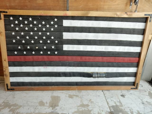 Firehose Flag made from used firehose with coupler